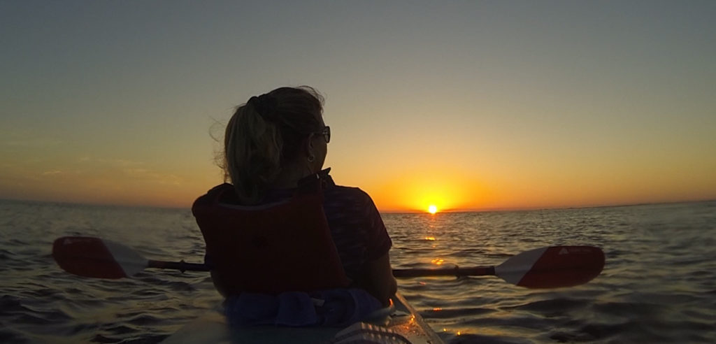 tandem kakay paddle on the gulf of mexico shoreline