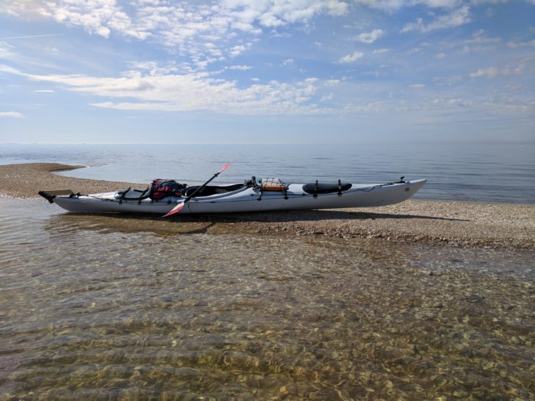grey prijon 18′ kodiak sitting on a shoal gulf of mexico